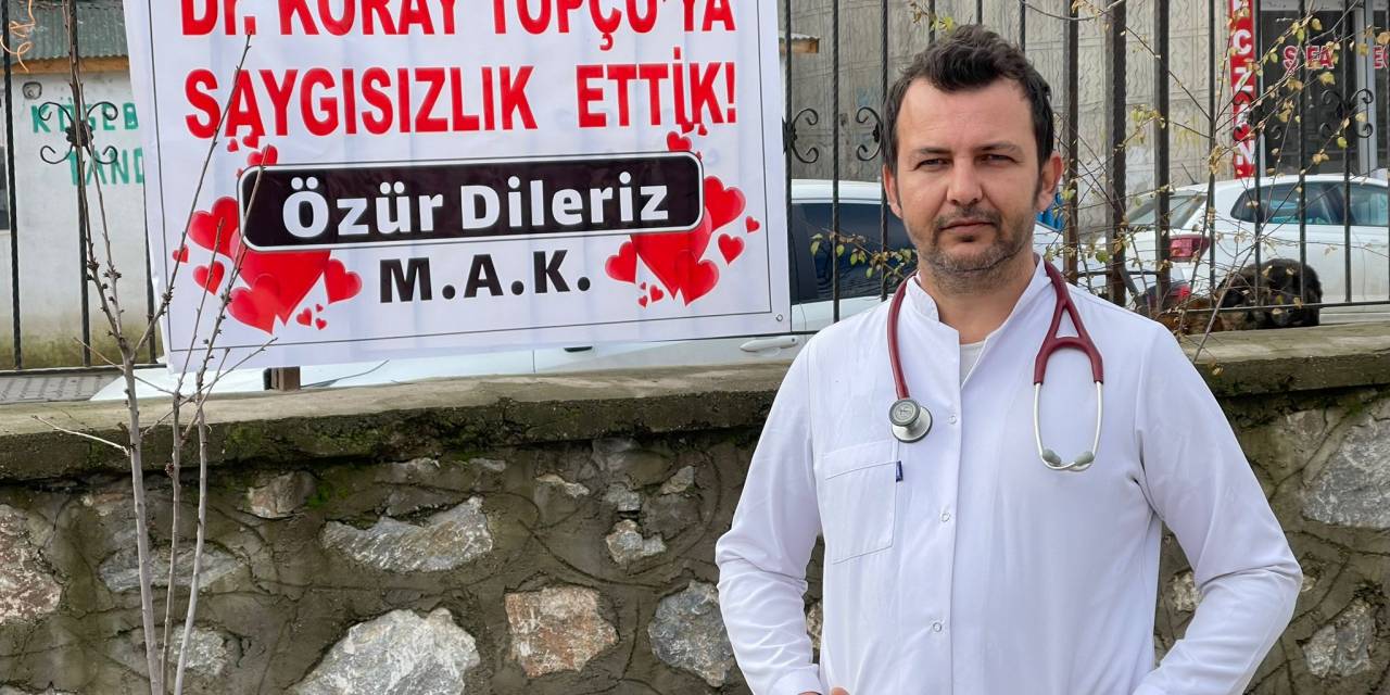 Tartıştıkları doktordan pankartla özür dilediler
