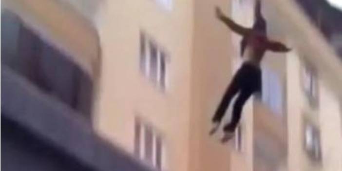 Terastan atlayan 18 yaşındaki genç kızın düşme anı